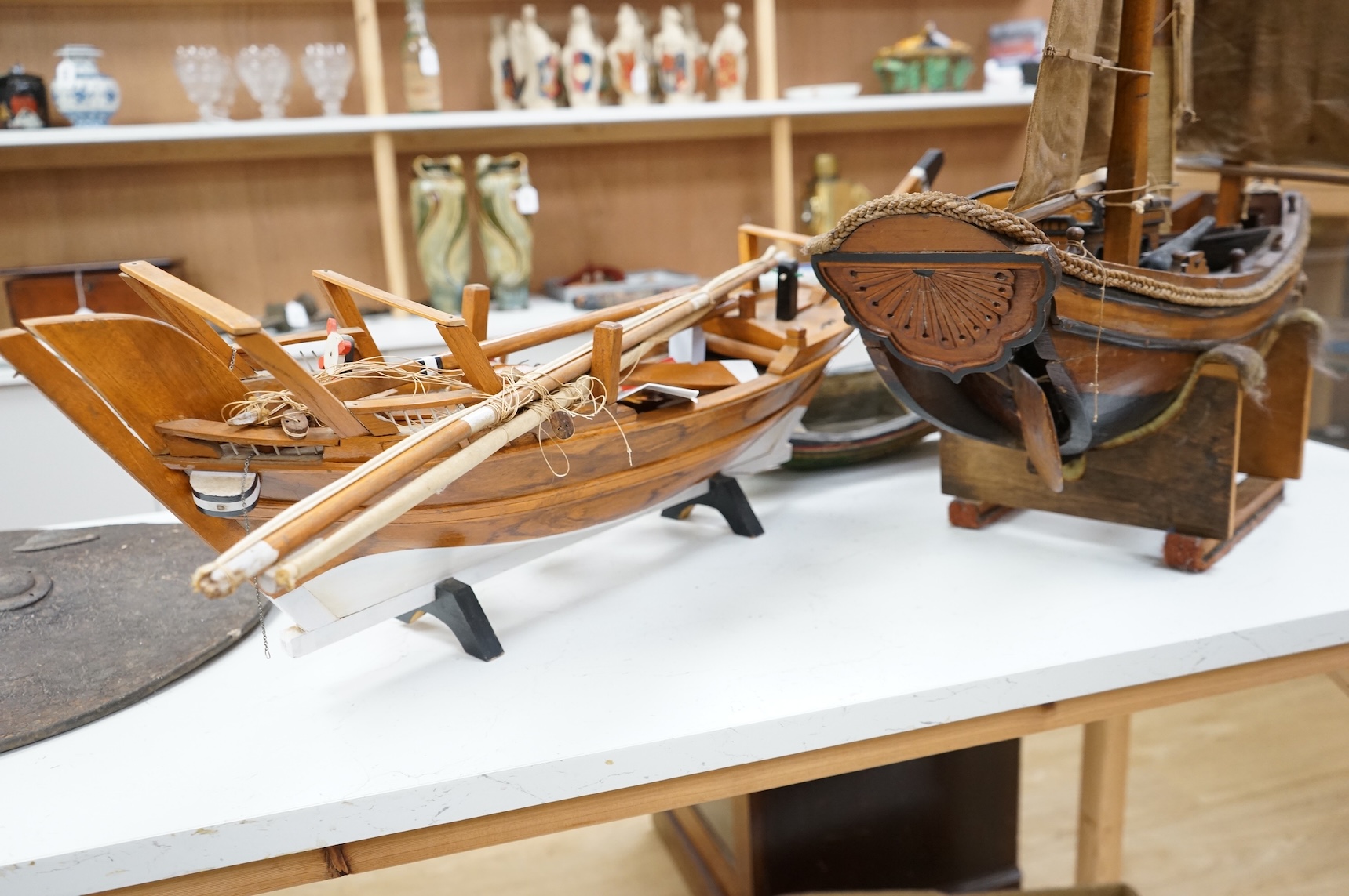 A model of a Chinese junk, a model ship and two other models of boats, largest 71cm in length